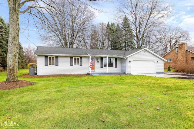 single story home featuring a front yard and a garage