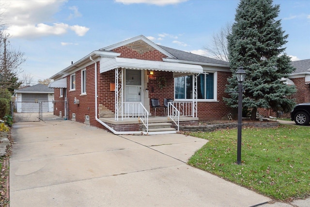 bungalow-style house with a front yard