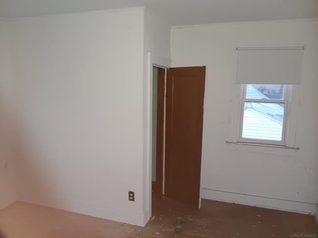 interior space with crown molding