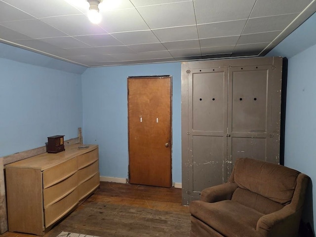 sitting room with dark hardwood / wood-style flooring