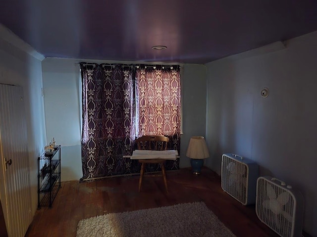 living area with wood-type flooring