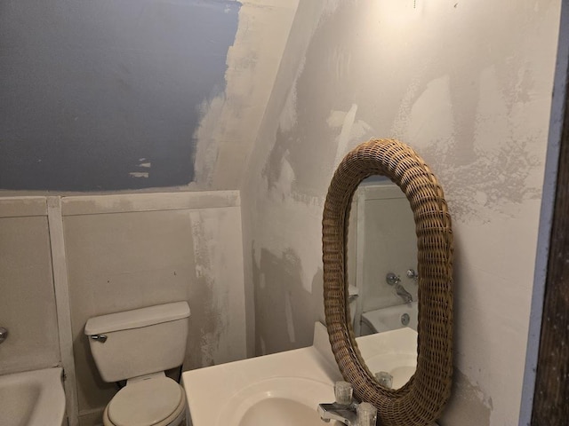 bathroom with sink and toilet