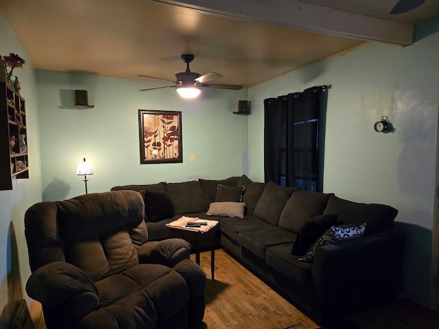 living room with beam ceiling, ceiling fan, and hardwood / wood-style flooring