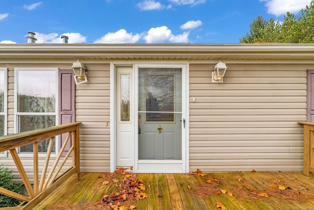 doorway to property featuring a deck