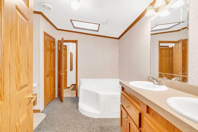 bathroom featuring a bath, a textured ceiling, lofted ceiling, vanity, and ornamental molding