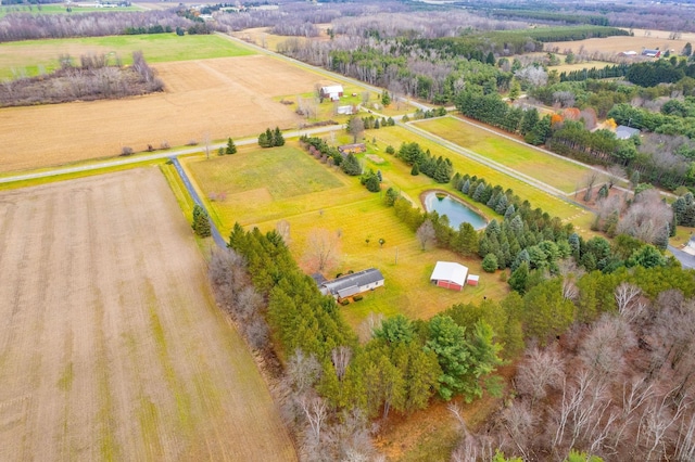 bird's eye view featuring a rural view and a water view