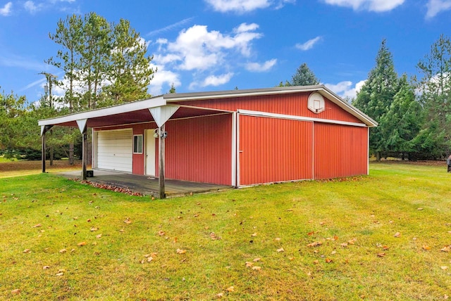 view of outdoor structure with a lawn