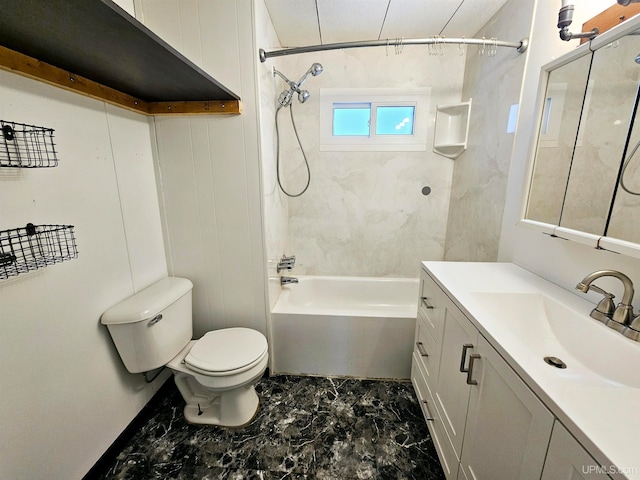 full bathroom featuring toilet, vanity, and tiled shower / bath