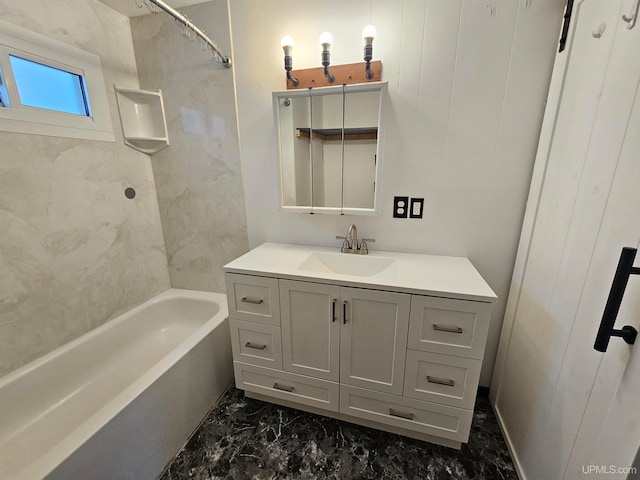 bathroom featuring vanity and bathtub / shower combination