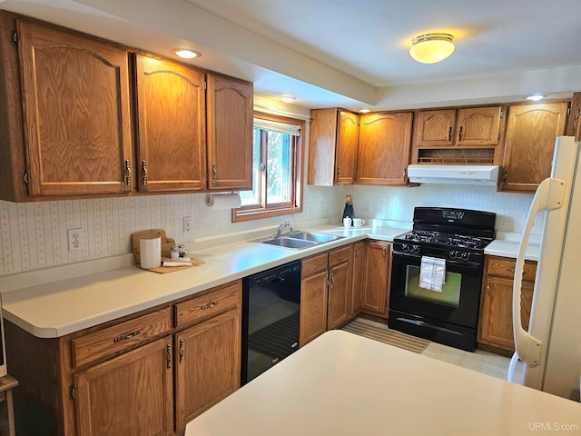 kitchen with black appliances and sink