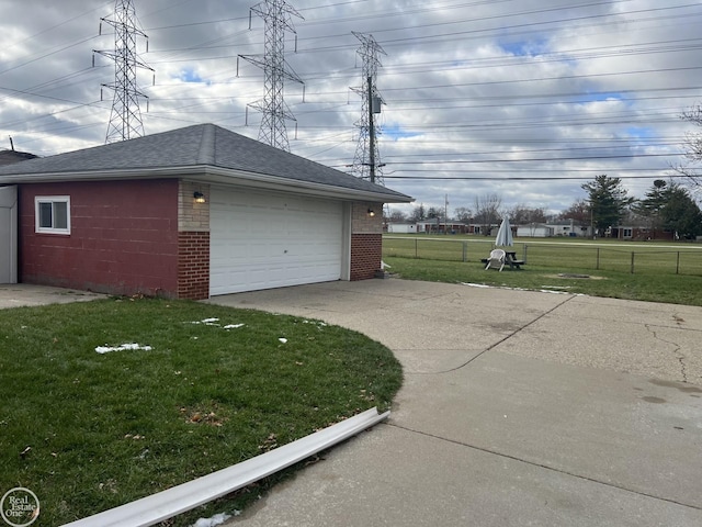 garage with a lawn