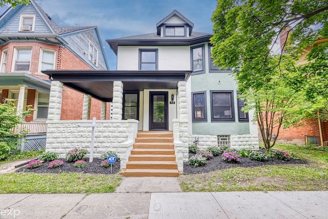 view of front of house with covered porch