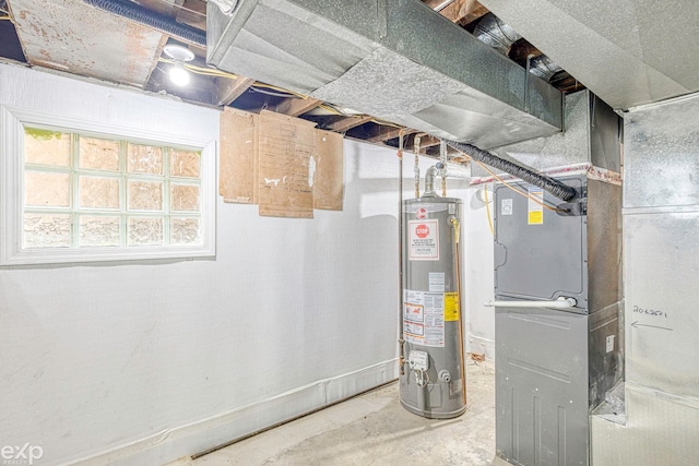 utility room with water heater