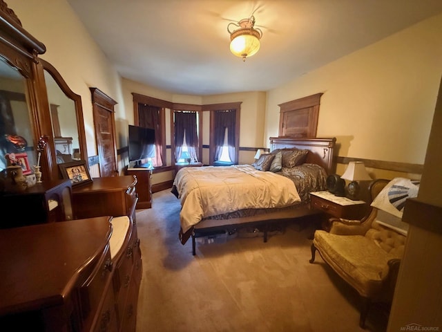 bedroom with dark carpet