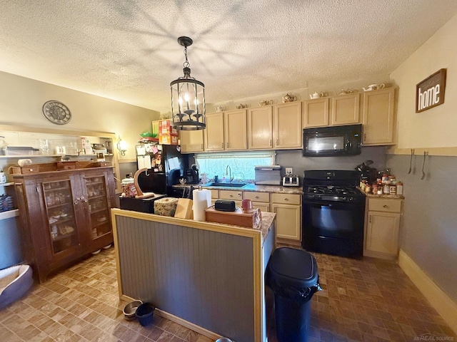 kitchen with hanging light fixtures, black appliances, a textured ceiling, and sink