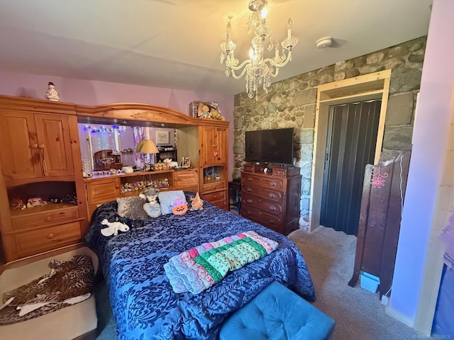 bedroom with carpet floors and an inviting chandelier