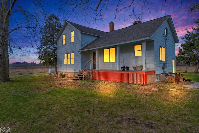 view of front of property with a lawn