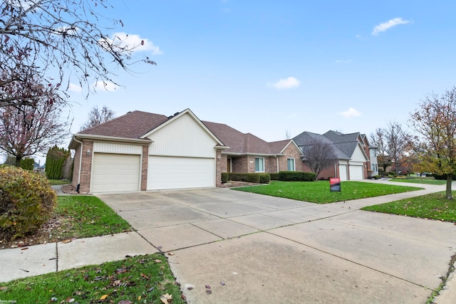 ranch-style home with a front yard and a garage