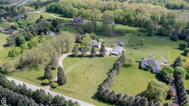 birds eye view of property featuring a rural view