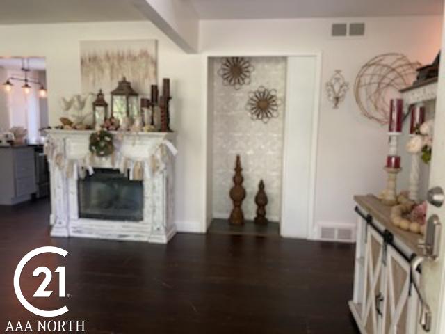 living room featuring dark hardwood / wood-style floors