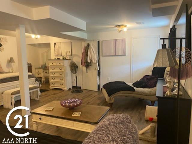 living room with dark wood-type flooring