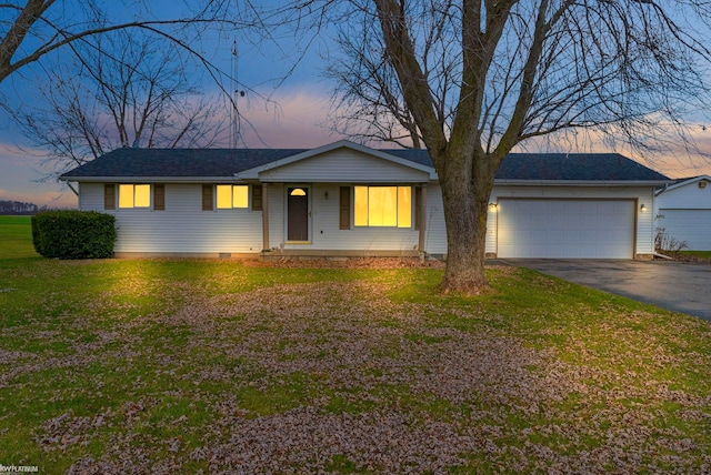 ranch-style house featuring a lawn