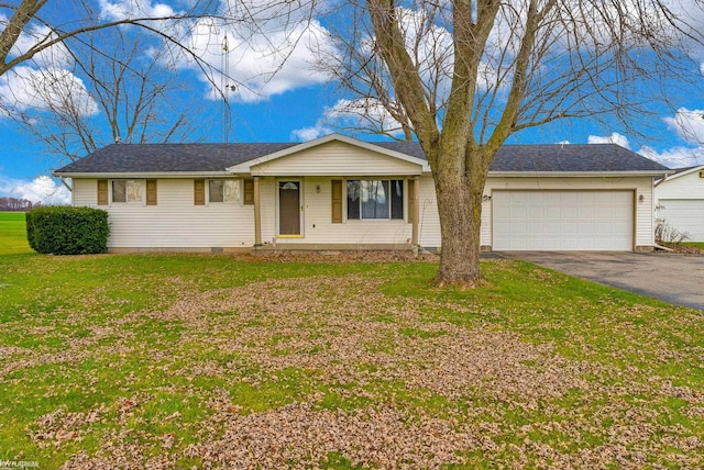 ranch-style home with a garage and a front yard