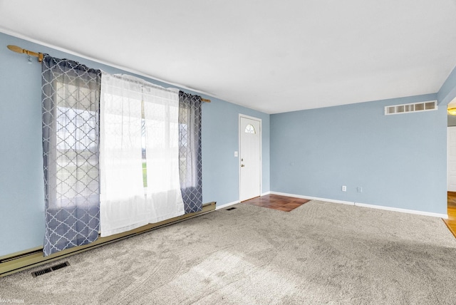 empty room with carpet flooring