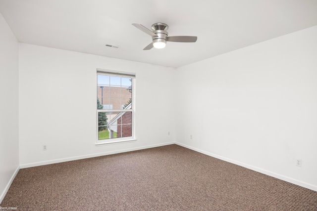 unfurnished room featuring carpet floors and ceiling fan