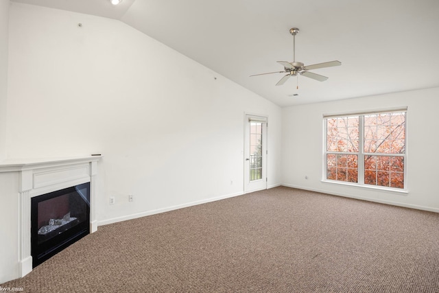 unfurnished living room featuring carpet, ceiling fan, and lofted ceiling