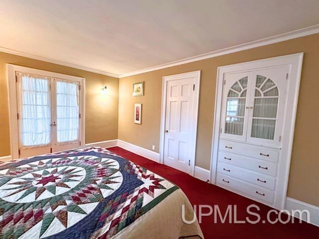 bedroom featuring crown molding and french doors