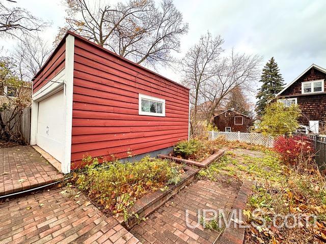 view of outdoor structure featuring a garage