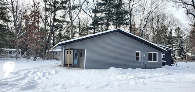 view of snow covered property