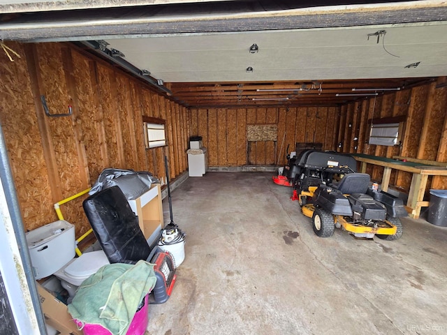 garage with wood walls