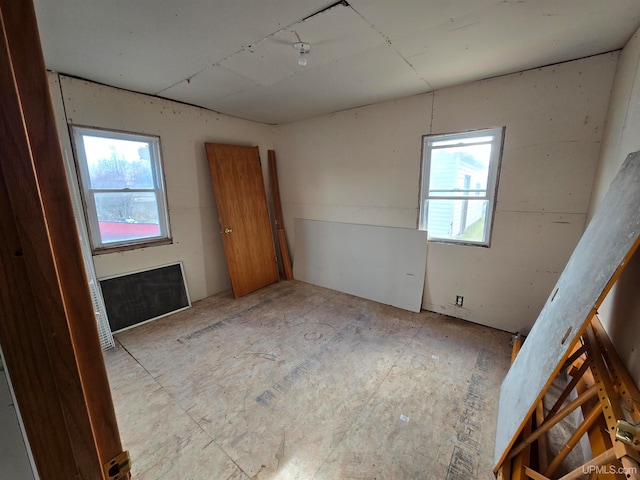 spare room featuring a wealth of natural light