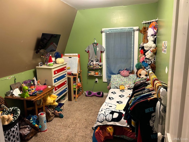 carpeted bedroom featuring lofted ceiling