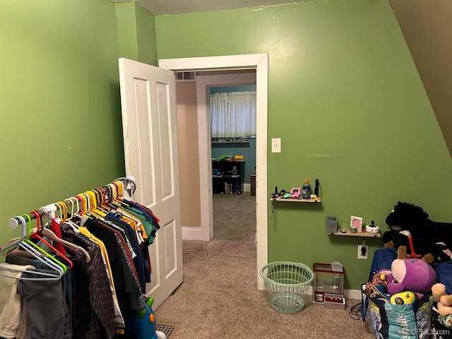 rec room featuring carpet floors, visible vents, and baseboards