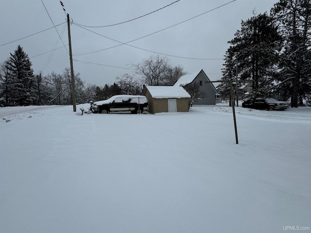 view of yard covered in snow