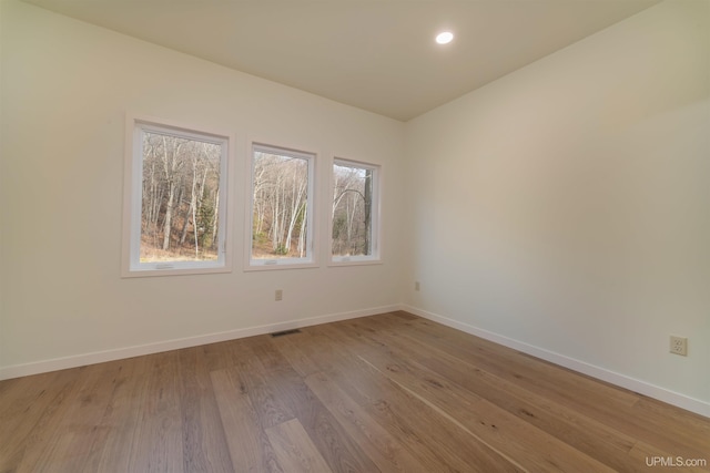 empty room featuring light hardwood / wood-style flooring