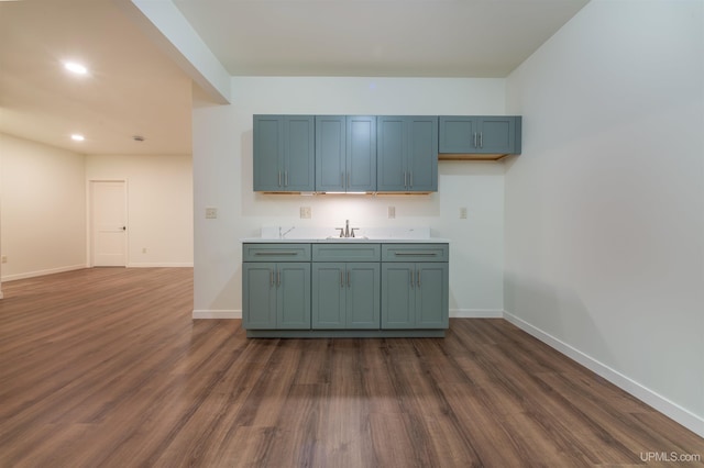 kitchen with sink and dark hardwood / wood-style floors