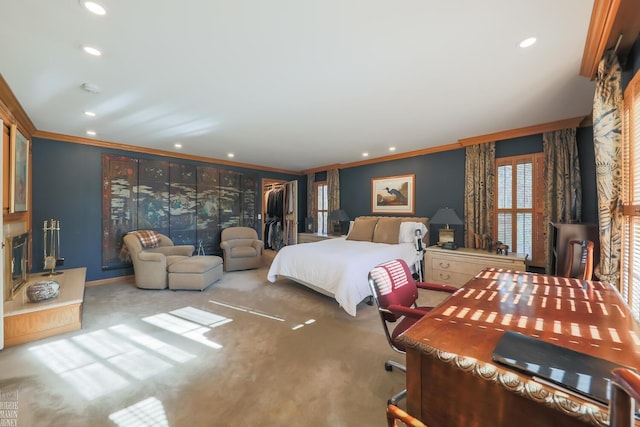 bedroom with crown molding and carpet