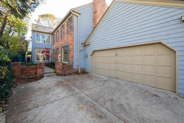 view of home's exterior with a garage