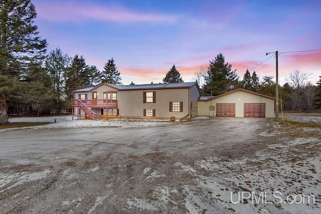 view of front of house with a wooden deck