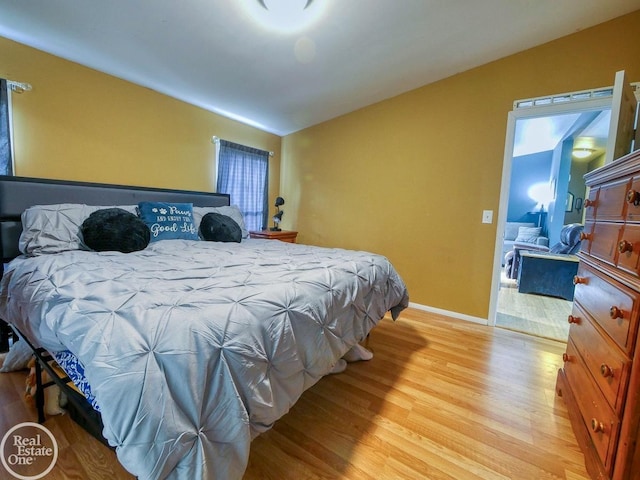 bedroom featuring light hardwood / wood-style floors