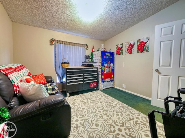 carpeted bedroom featuring lofted ceiling and a textured ceiling