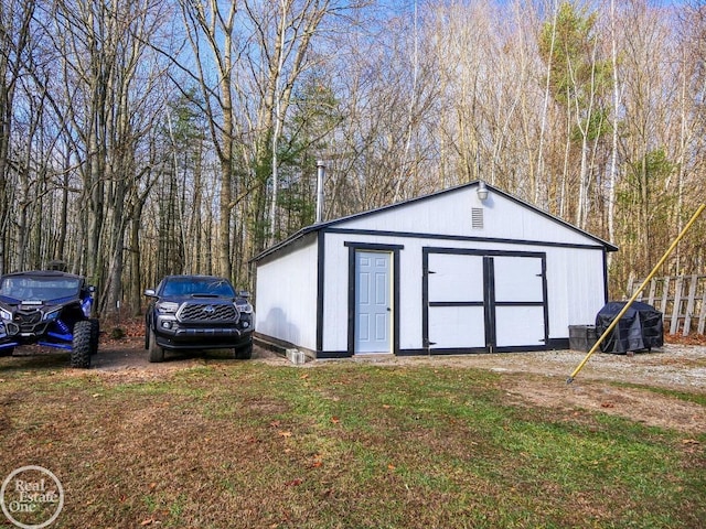 view of outdoor structure featuring a yard