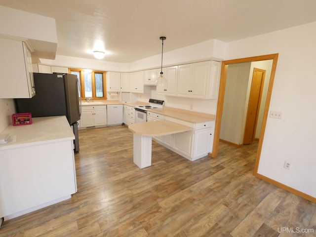 kitchen with white cabinetry, sink, light hardwood / wood-style floors, white appliances, and decorative light fixtures