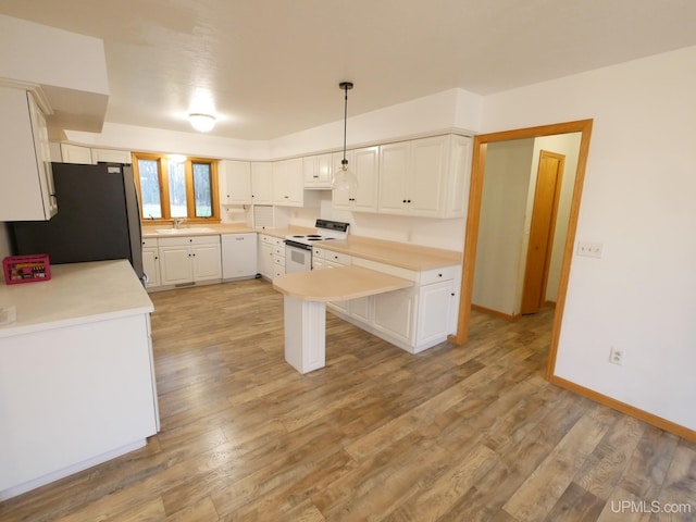 kitchen with white cabinets, white electric range, hanging light fixtures, stainless steel fridge, and light wood-type flooring