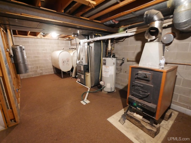 basement with gas water heater and heating unit