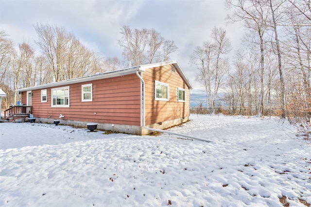 view of snow covered house